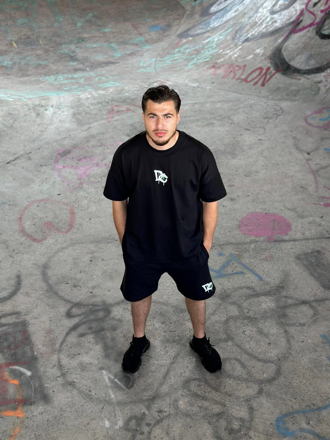 Oversized Black T-shirt with green DC details