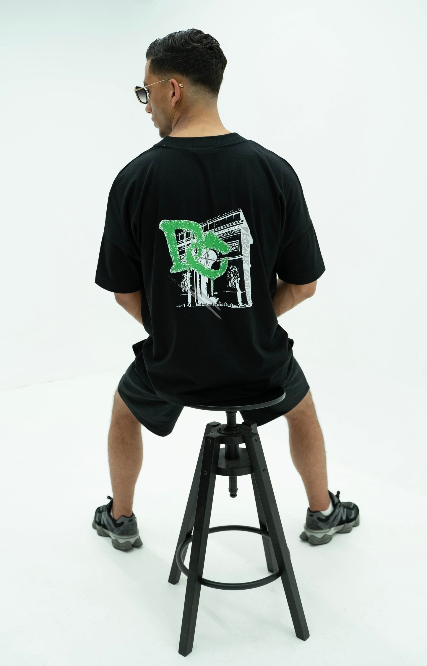 Oversized Black T-shirt with green DC details