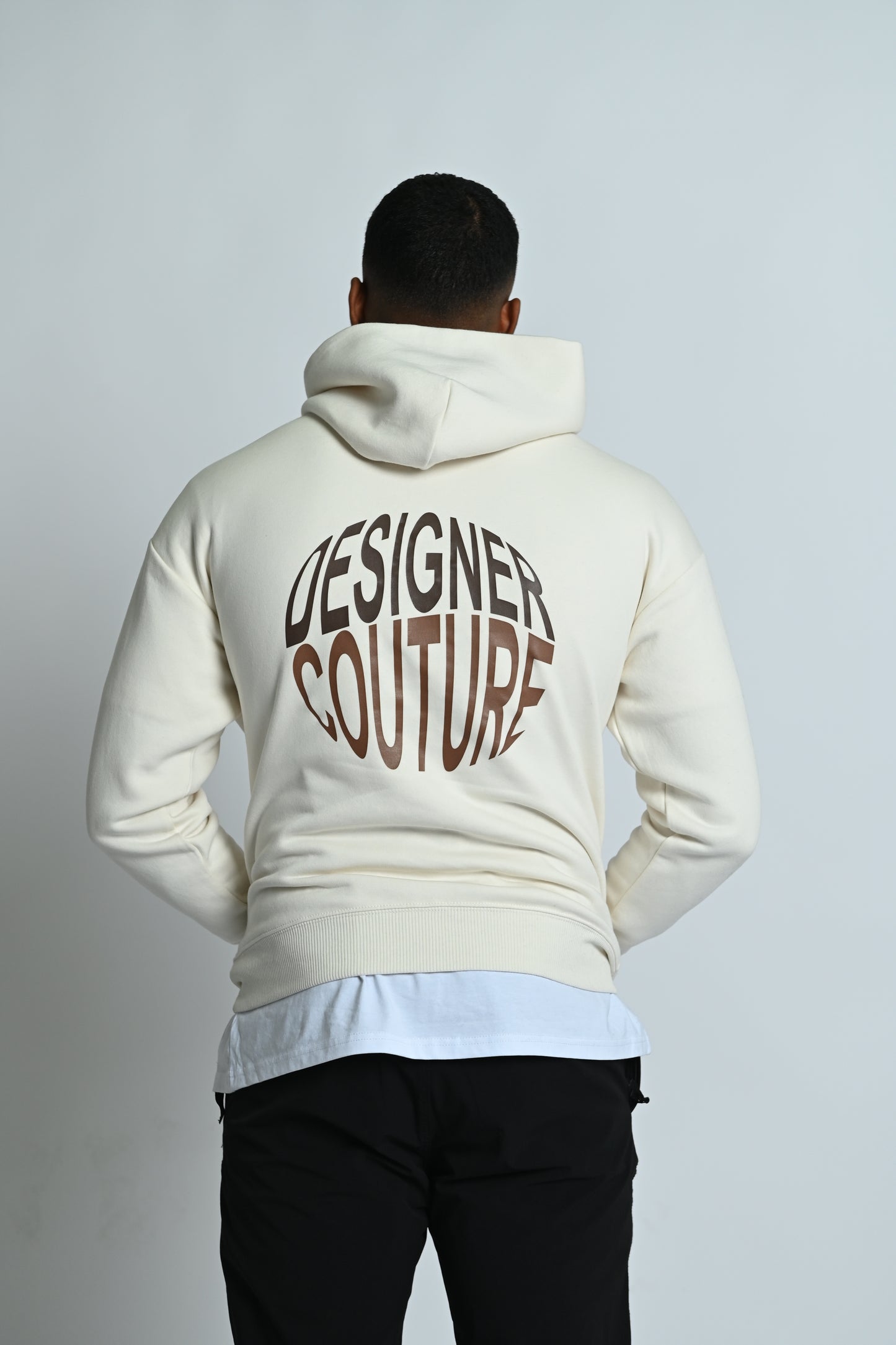 Natuurlijke rauwe oversized DC-hoodie met bruine details