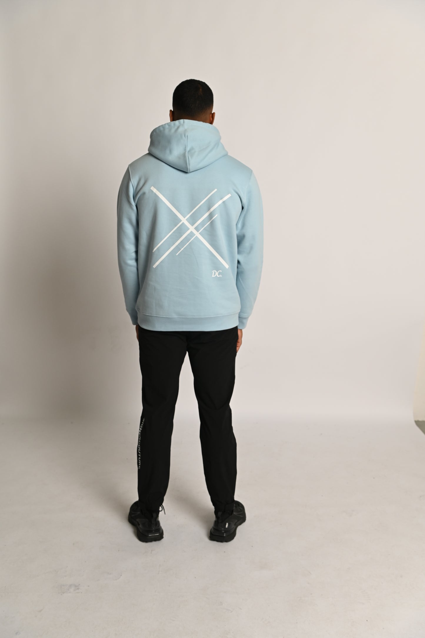 Babyblauwe DC-hoodie