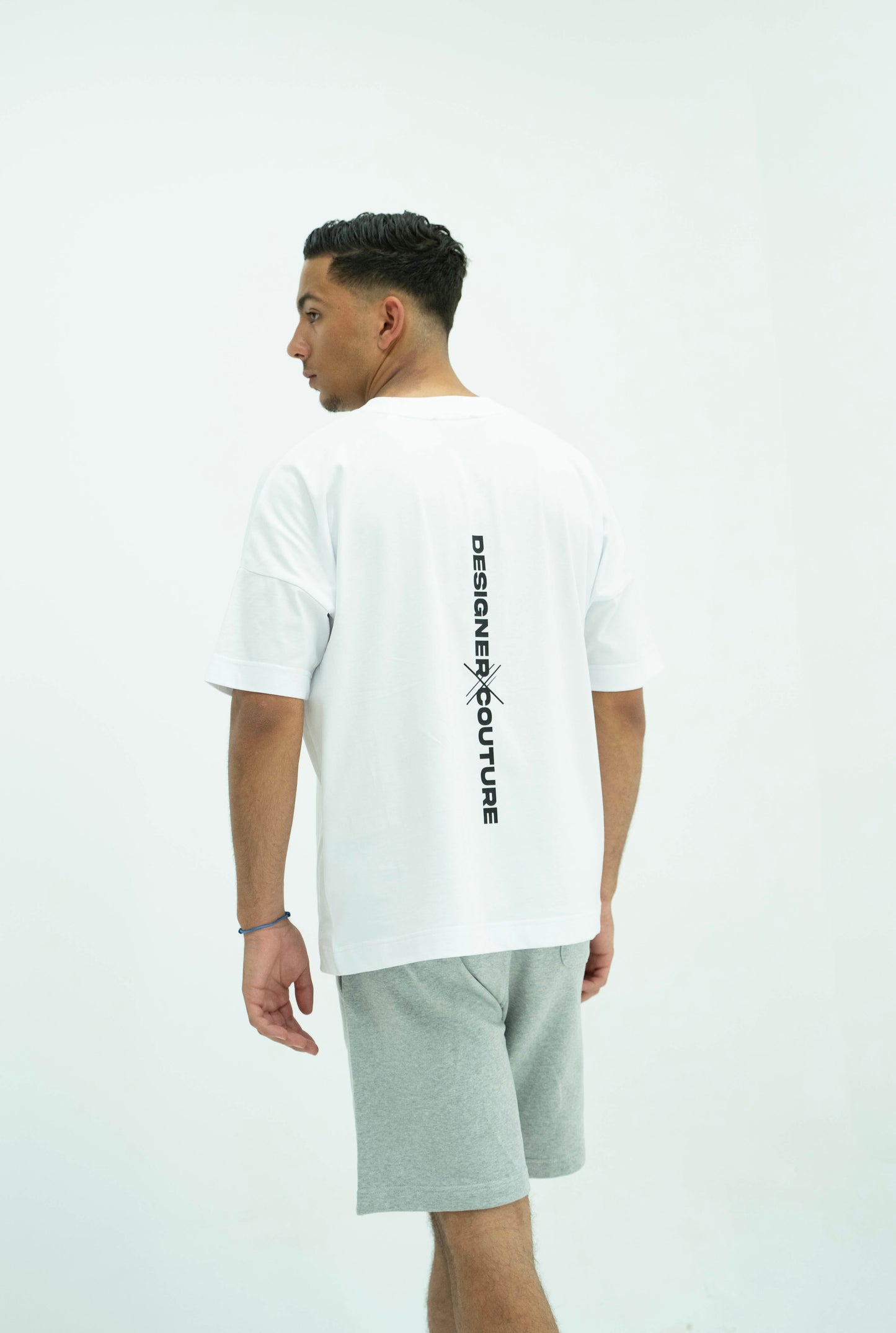 Oversized White T-shirt with Long DC detail in the back