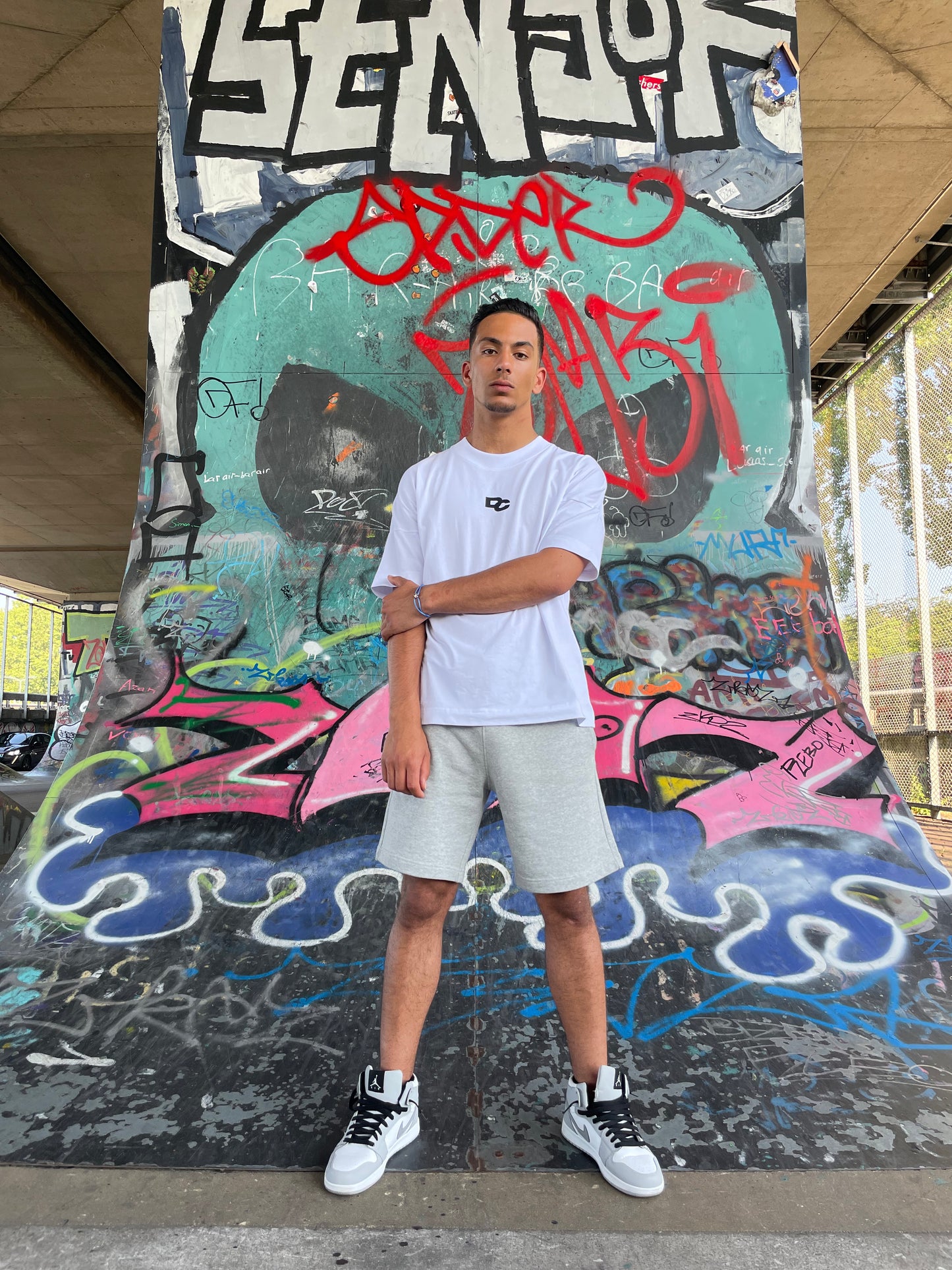 Oversized White T-shirt with Long DC detail in the back